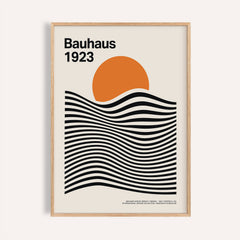 Framed print close-up of Bauhaus Gallery Wall Art with orange sun and black wavy lines on cream