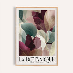 Framed print close-up of burgundy wall art with abstract leaves in muted greens and beige