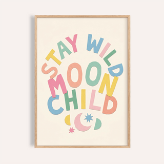 Close-up of Moon Child wall art with colourful typography and moon and stars in a wooden frame
