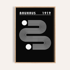 Framed Black Minimalist Art with white linear abstract shapes and Bauhaus 1919 text