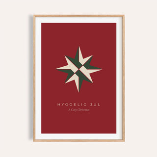 Red paper star Christmas print shown on a plain warm wall