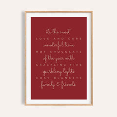 Red most wonderful time quote print shown on a plain warm wall