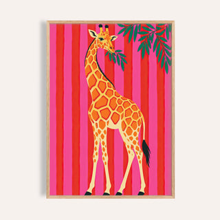 Giraffe wall art with a giraffe eating leaves against pink and red stripes