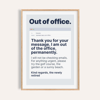 Out of office email print shown on a plain warm cream wall