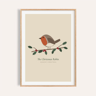 Christmas robin on holly print shown on a plain warm wall
