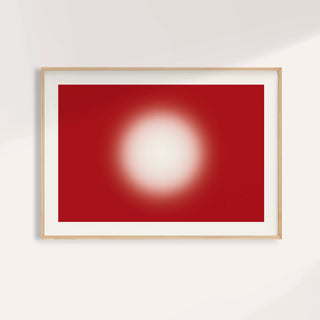 Red abstract wall art with a glowing cream orb on a deep cherry red ground