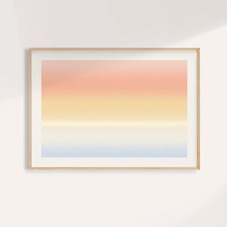 Sunrise wall art fading from blush pink through peach and gold to soft blue