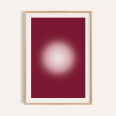 Burgundy aura print with a glowing pale pink orb on deep raspberry