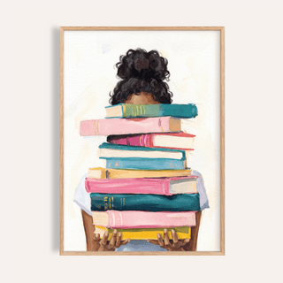 Book Lover Art Print framed close-up with person holding colourful stack of books in watercolour style