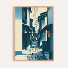 Framed Japanese street wall art with blue and cream tones and a red lantern detail