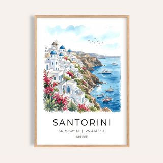 Santorini art print of a blue and white cliffside village with boats in the sea