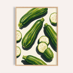 Framed zucchini wall art featuring green illustrated zucchinis on a cream background
