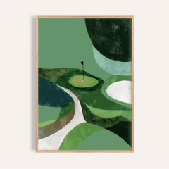 Framed minimalist golf poster of a golf course flag with abstract green shapes on a wall