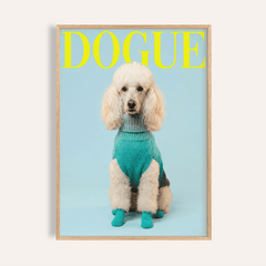 Framed Pet Wall Decor of white poodle in teal sweater and socks on pale blue background