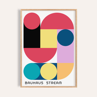 Framed close-up of large colourful wall art with abstract geometric shapes in pink, yellow, blue and black