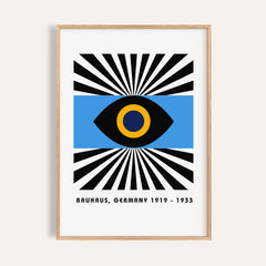 Framed Modern Art Geometric print of an abstract eye with black, blue and yellow shapes
