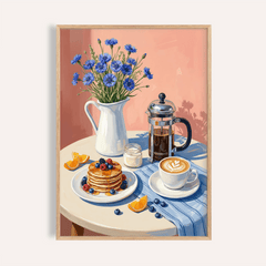Framed Breakfast Art Print of pancakes with berries, coffee, and blue flowers on a table