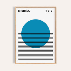 Minimlist Art framed print of abstract blue circle with black horizontal lines in a light wooden frame