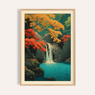 Framed close-up of Hasui Kawase waterfall print with autumn leaves in orange and red with blue water