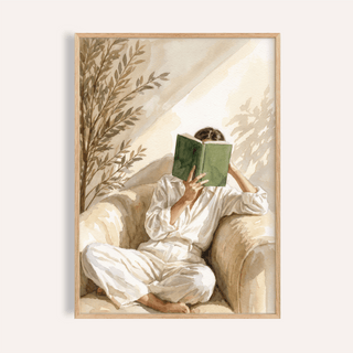 Framed print close-up of a woman reading a green book in neutral tones with a leafy shadow