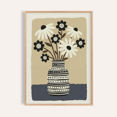 Framed print close-up of flower vase wall art with black and white flowers and patterned vase
