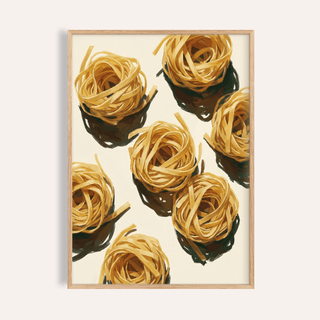 Framed close-up of Fettuccine Print showing illustrated yellow fettuccine nests with dark shadows