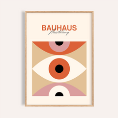 Framed close-up of minimalist eye art with orange and pink abstract shapes