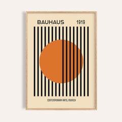 Framed Bauhaus Decor print with orange circle and black stripes on cream background