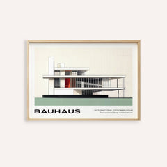 Framed Bauhaus Blueprint wall art showing a minimalist building illustration with white, black and green colours