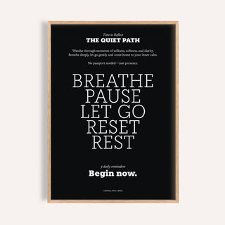 Meditation wall art with white motivational text on a black background in a light wood frame