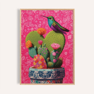 Jewel-toned hummingbird perched on corazon de nopal art print for living room