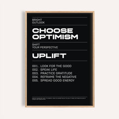 Framed affirmation print with Choose Optimism text in white on black background