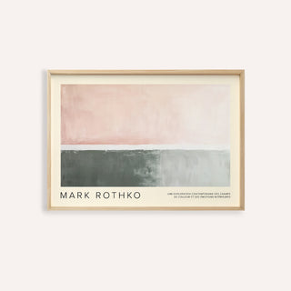 Framed print of abstract blocks in pink and grey hues with text at the bottom