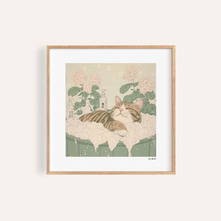 Framed print of a tabby cat relaxing in a bubble bath with pink flowers in background