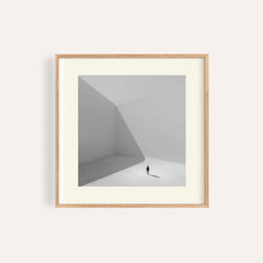 Square Art Prints showing a minimalist photographic art of a lonely man in grey tones