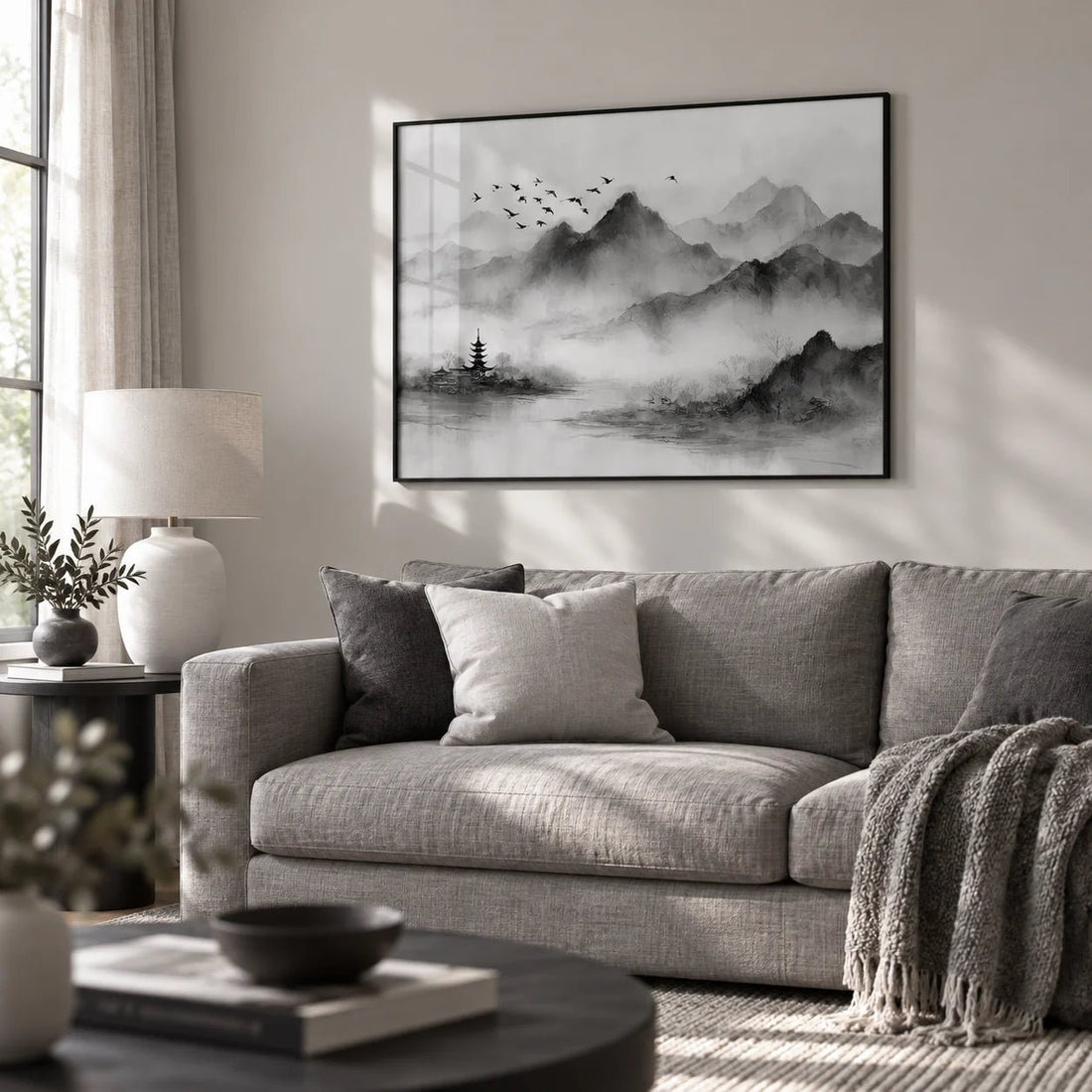 Black and white mountain print in a reading nook