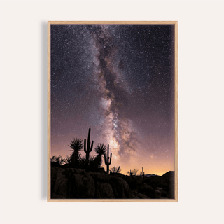 Cactus Night Print framed close-up showing a saguaro cactus silhouette against starry night sky with purple and orange hues