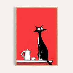 Framed close-up of whimsical cat wall art with black and white cat on red background