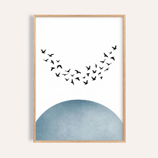 Minimal wall decor showing flying bird silhouettes above a blue semicircle