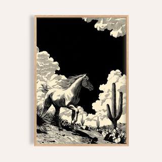 Running Horse wall art featuring a black and white wild horse and desert plants in a natural frame