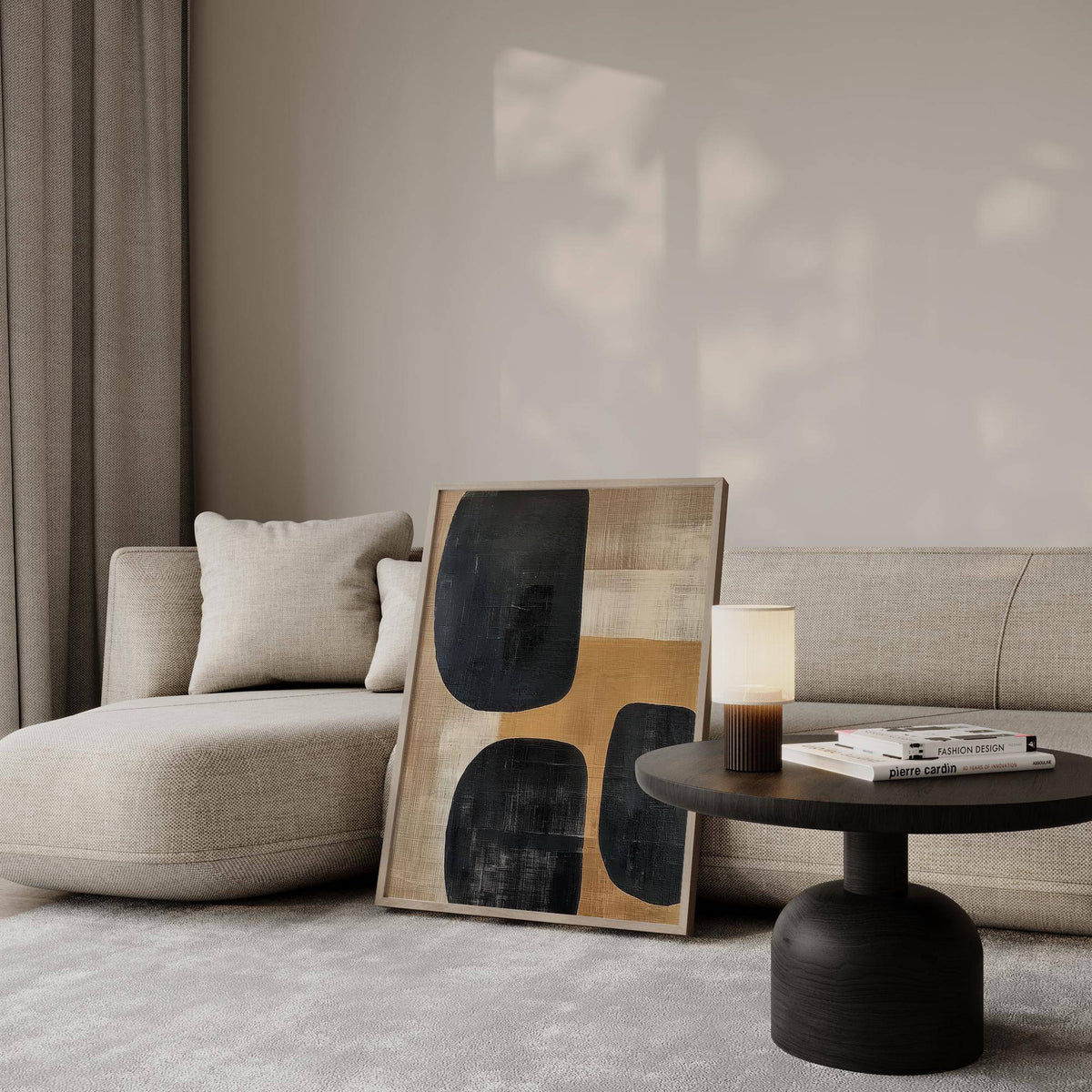 Earthy abstract art print leaning beside a sofa