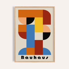 Framed print of wall art geometric shapes with Bauhaus text in red, blue and yellow colours