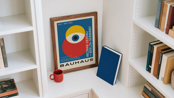 Bauhaus A4 Photo Prints displayed on bookshelf in Blue, Red and Yellow