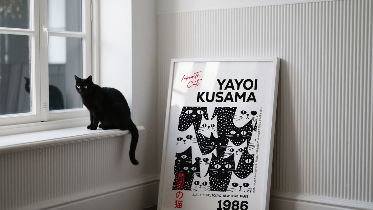 Framed print of black cats in dot style design, titled 'Yayoi Kusama', a playful example of large black and white wall art