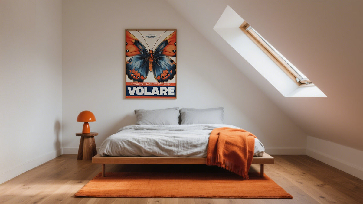 Finding Bedroom Art: Minimalist room with butterfly print and orange accents.