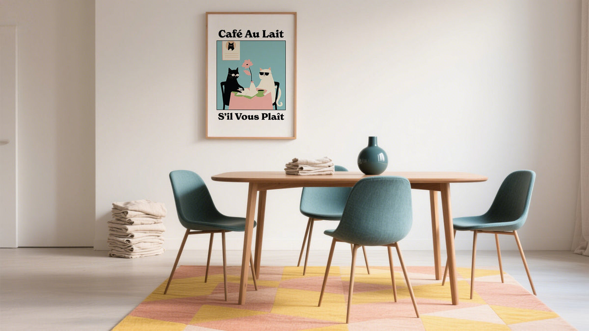 Dining Table with Prints Room Art above table and chairs