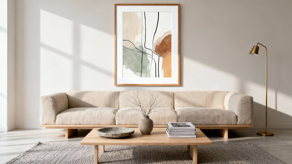 Framed wall art mockup showcasing a stylish gallery wall above a couch for interior design inspiration.