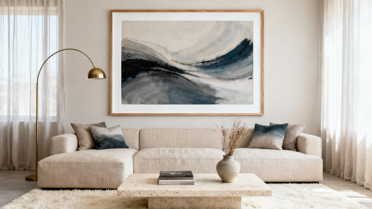 Framed large abstract wall art in a stylish living room, enhancing decor and aesthetic appeal.