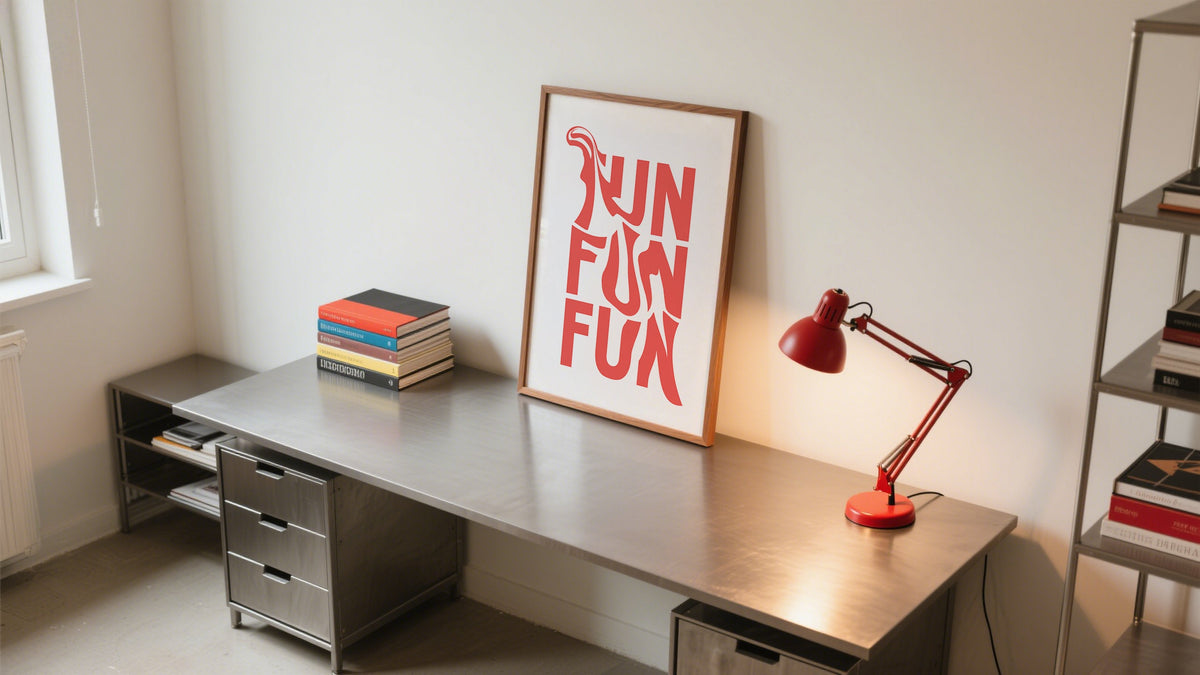 Minimalist home office styled with framed bold red typography print featuring the words “FUN FUN FUN” as part of the room's bold and beautiful fun wall decor.