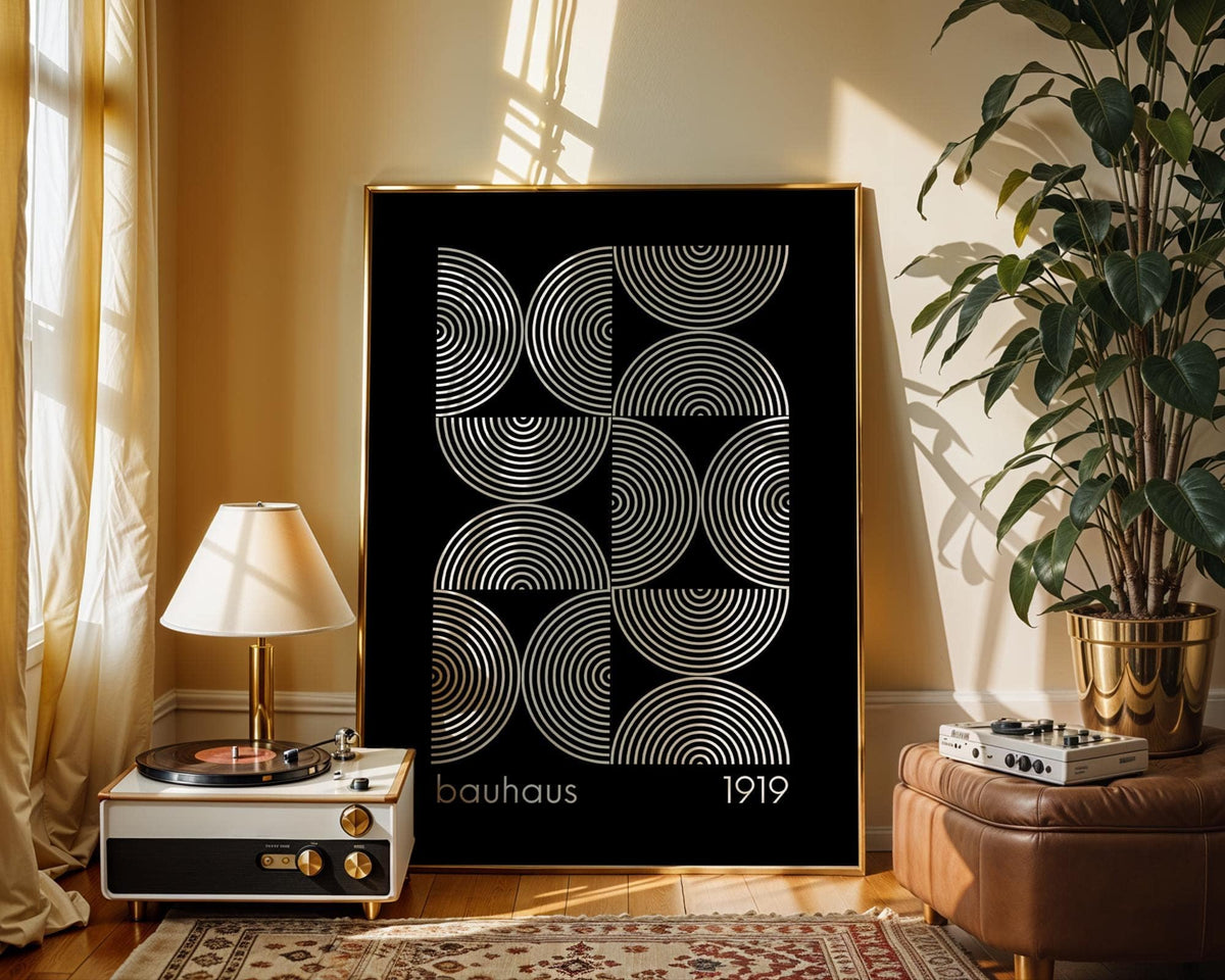 Bold geometric poster featuring concentric circle geometric shapes in a Bauhaus 1919 design, framed and displayed in a cozy living space.